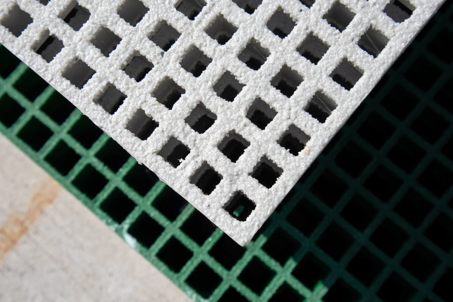 What is Glass Reinforced Polymer?

Glass reinforced polymer is a type of fibre reinforced polymer constructed using glass fibres. These fibres are encased in a polymer matrix or polymer resin, which holds the glass fibres in place and transfers forces throughout the material. GRP may also be referred to as fibreglass composite or fibreglass.

The combination of glass fibres and polymer creates a strong and durable material that is exceptionally lightweight. It can be moulded into a range of different shapes and provides electrical insulation.